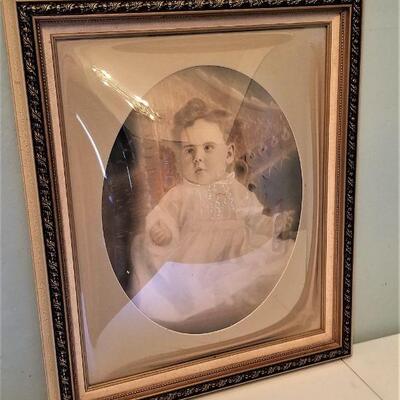 Lot #44  Vintage Hand colored baby portrait in bubble glass frame