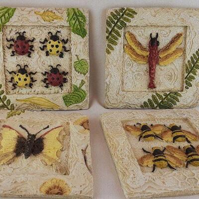 Four Hanging Resin Garden Plaques