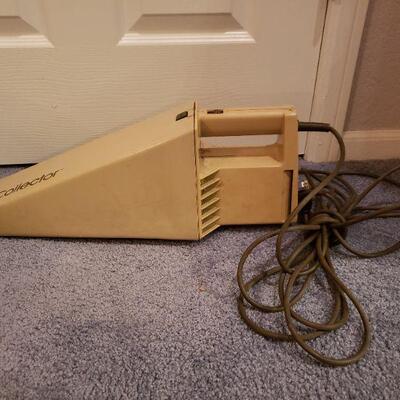 Lot 203: Vintage Collector Handheld Vaccum