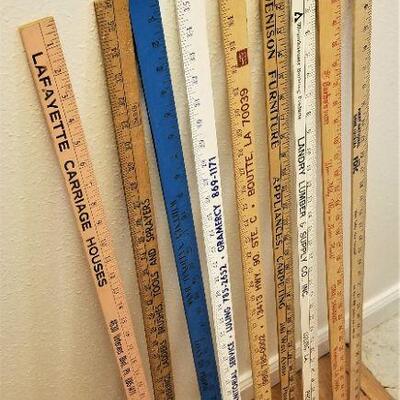 Lot #51  Lot of 9 Advertising Yard Sticks - vintage