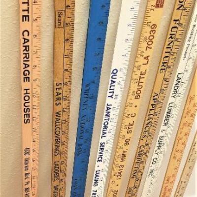 Lot #51  Lot of 9 Advertising Yard Sticks - vintage