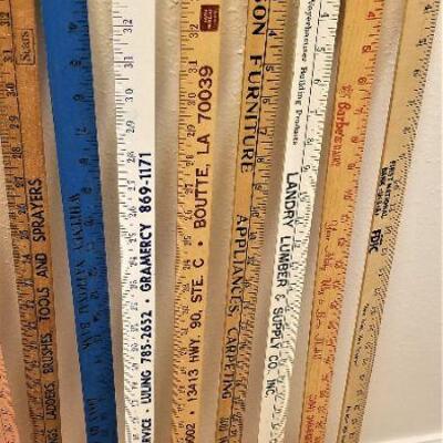 Lot #51  Lot of 9 Advertising Yard Sticks - vintage