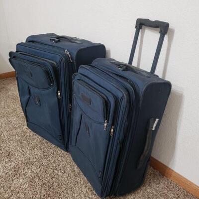 Lot 294: (2) Blue Travelpro Luggage