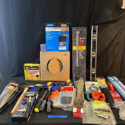 Lot 104 - Tools (Craftsman 25 - 250 ft-lb torque wrench, level, outdoor electrical wire, sandpaper, hammer, large flashlight, Quick...