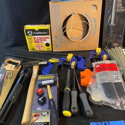 Lot 104 - Tools (Craftsman 25 - 250 ft-lb torque wrench, level, outdoor electrical wire, sandpaper, hammer, large flashlight, Quick...