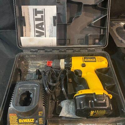 Lot 105 - Dewalt Drill, Charger, Case and Large Collection of Circular Saw Blades