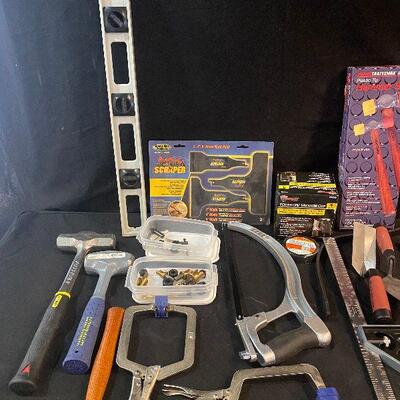 Lot 107 - Tools and Hardware (Level, force power grip, hand saw, Craftsman tack hammer, square lock cutters, large hammer, pickup tool,...