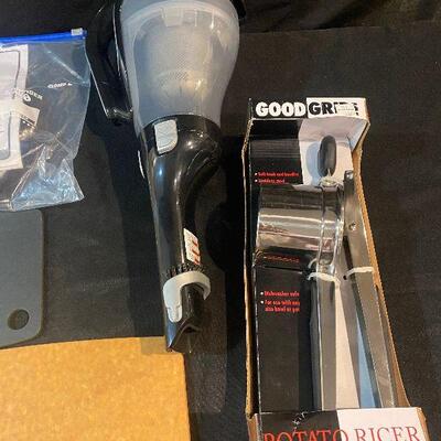 Lot 109 - Kitchen Items (Black & Decker Dustbuster ( tested - works), cutting boards, serving boards, Good Grips potato slicer)