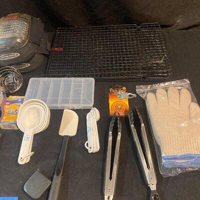 Lot 111 = Kitchen Items (Cookie cooling racks, zip ties, knee pads, small mirror, cookie cutters, measuring spoons, gloves)