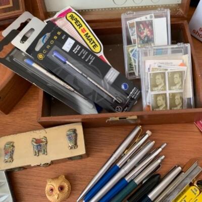 Lot 10U. Commemorative pens, pads, music box, tin boxes, wooden boxes, foreign postage,etc.--$55