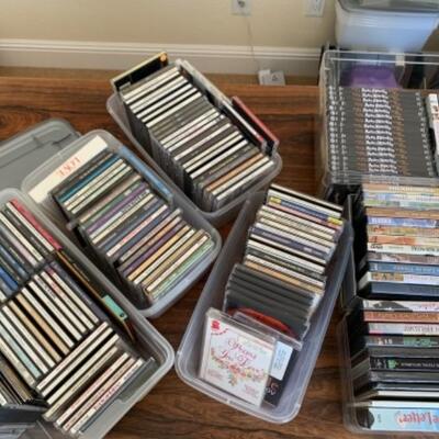 Lot 19U. Large assortment of DVDs and CDs--$50