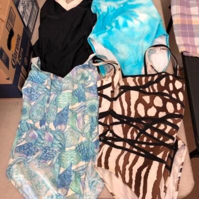 Lot 29U. Lot of bathing suits (womanâ€™s size 16); 2 pairs of menâ€™s shorts; vintage womenâ€™s Hawaiian suit--$65