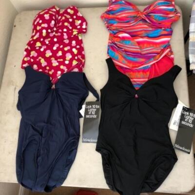Lot 29U. Lot of bathing suits (womanâ€™s size 16); 2 pairs of menâ€™s shorts; vintage womenâ€™s Hawaiian suit--$65