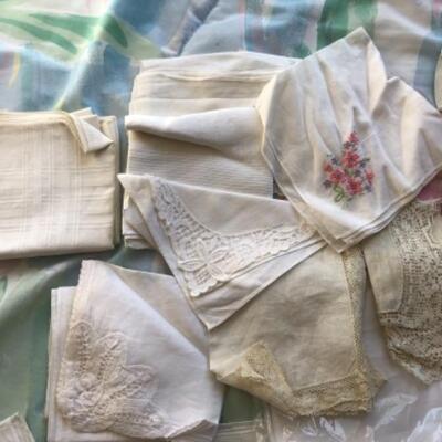 Lot 39U. Cotton gloves, French maidâ€™s accessories, menâ€™s and womenâ€™s assorted vintage hankies, multiple vintage tablecloths with...