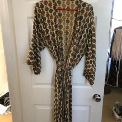 Lot 45U. Three leather skirts (Size 16), 1 sweater set, robes (new),  bed jackets: chiffon and faux fur--$175