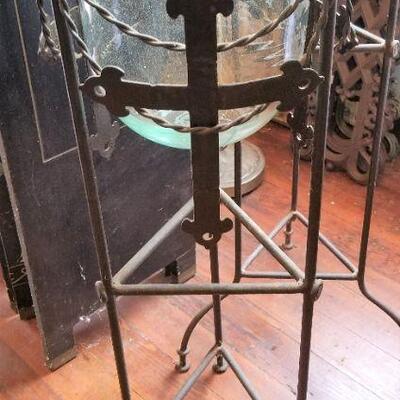 Lot #109  Pair of Gothic-themed Metal Candle Stands with Glass inserts
