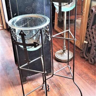 Lot #109  Pair of Gothic-themed Metal Candle Stands with Glass inserts