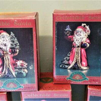 Lot #134  Lot of 25 Contemporary Mercury Glass Santas - 2 different designs.