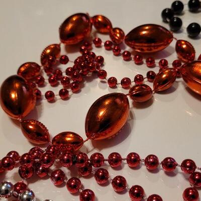 Lot #421: Assorted Mardi Gras Style Party Spirit Bead Necklaces Football Themed selections included