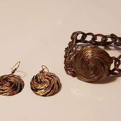 Lot 446: Mixed Metal Bracelet & Earrings 