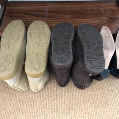 Lot 63U. Nine pairs of shoesâ€”3 menâ€™s running, sizes 9.5 to 11, mukluks, menâ€™s black leather loafers, Sudini boots, sandals,...