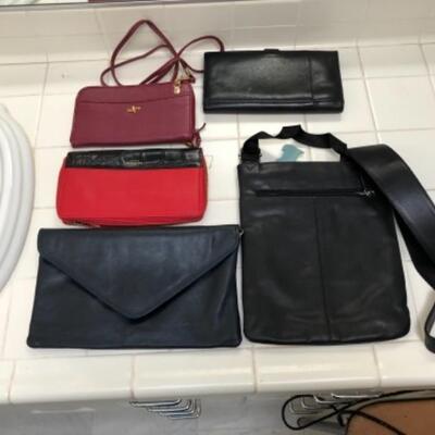 Lot 68U. Large selection of cross-body bags, passport cases, Leather cosmetic cases--$45