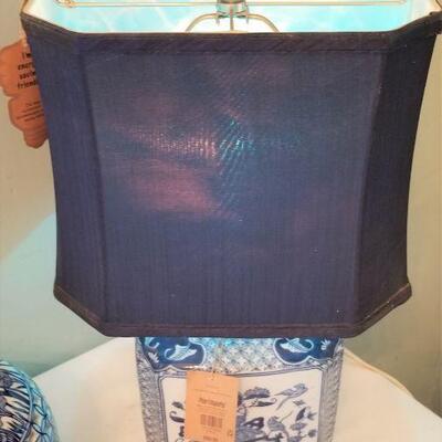 Lot #152  Pier One Table Lamp with Asian Styling and a Blue/White Pierced Vase