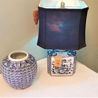 Lot #152  Pier One Table Lamp with Asian Styling and a Blue/White Pierced Vase