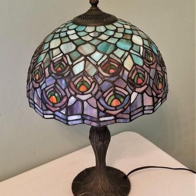 Lot #157  Contemporary Tiffany Style Table lamp "Peacock Feather" motif.