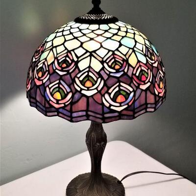 Lot #157  Contemporary Tiffany Style Table lamp "Peacock Feather" motif.