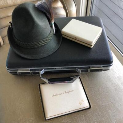 Lot 124U. Tyrolean walking hat with sterling pin and broom, size 7â€™ American Tourist briefcase (mint), vintage address book, vintage...