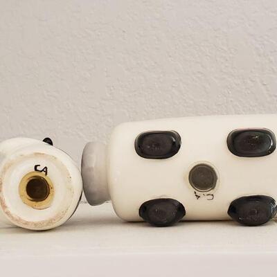Lot 613: Vintage Cow Flying an Airplane Salt & Pepper Shakers 