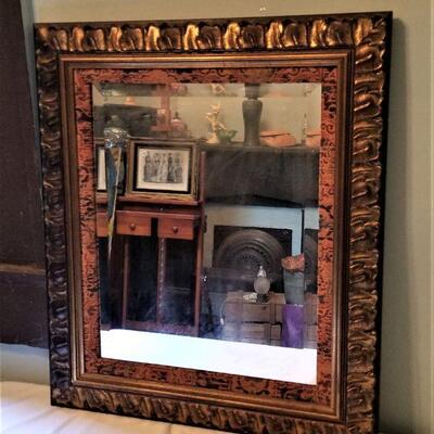 Lot #173   Wall Mirror in Dark Gilded Frame