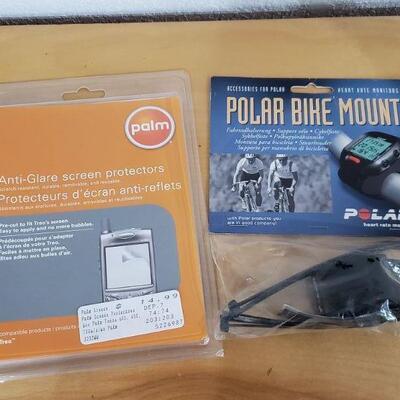 Lot 668: Polar Bike Mount and Screen Protectors 