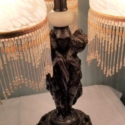 Lot #180  Three Arm Table Lamp with Classical Figures