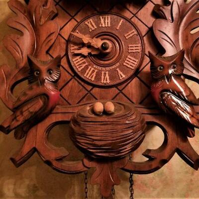 Lot #194  Cool Carved German Cuckoo Clock with moving figures