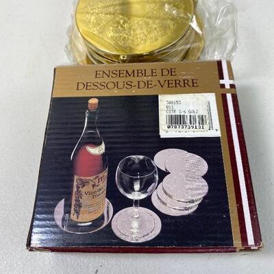 Lot# 133 S Gold Toned Wine Bottle Glass Coasters