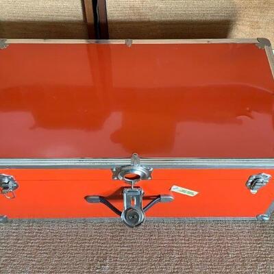 LOT 193 VINTAGE RED METAL FOOT LOCKER W/KEY