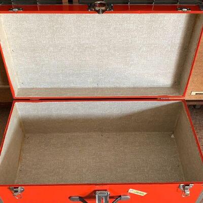 LOT 193 VINTAGE RED METAL FOOT LOCKER W/KEY