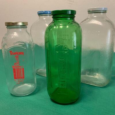 LOT 261 GROUP OF VINTAGE GLASS JUICE BOTTLES