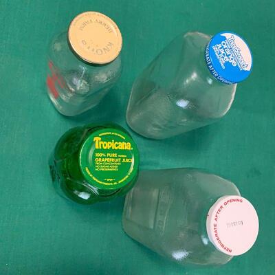 LOT 261 GROUP OF VINTAGE GLASS JUICE BOTTLES