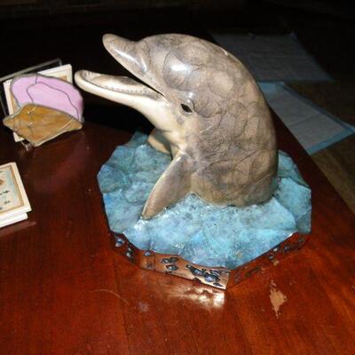 " Hand Sculpture of Dolphin by Wyland."