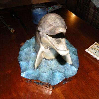 " Hand Sculpture of Dolphin by Wyland."