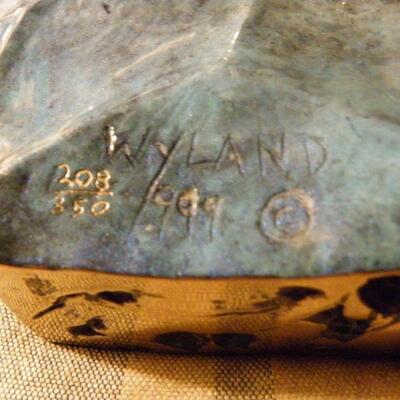" Hand Sculpture of Dolphin by Wyland."