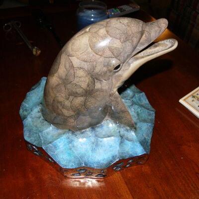" Hand Sculpture of Dolphin by Wyland."