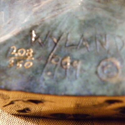 " Hand Sculpture of Dolphin by Wyland."