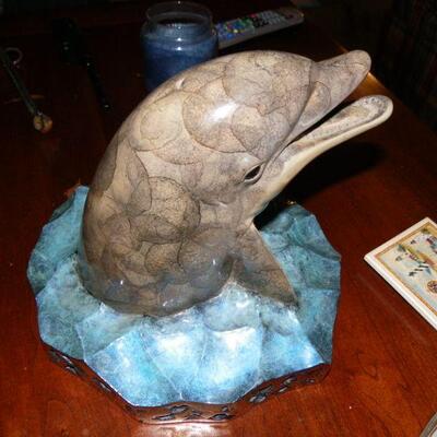 " Hand Sculpture of Dolphin by Wyland."