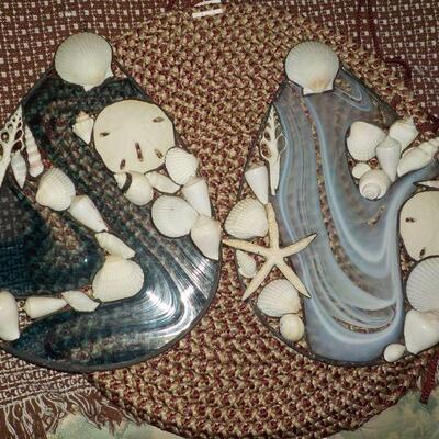 Stain glass window hangers with sea shell decor. "