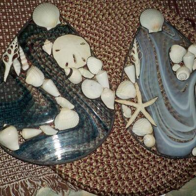 Stain glass window hangers with sea shell decor. "