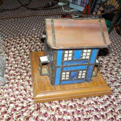 2 stain glass pieces shell and 2 story  house.
